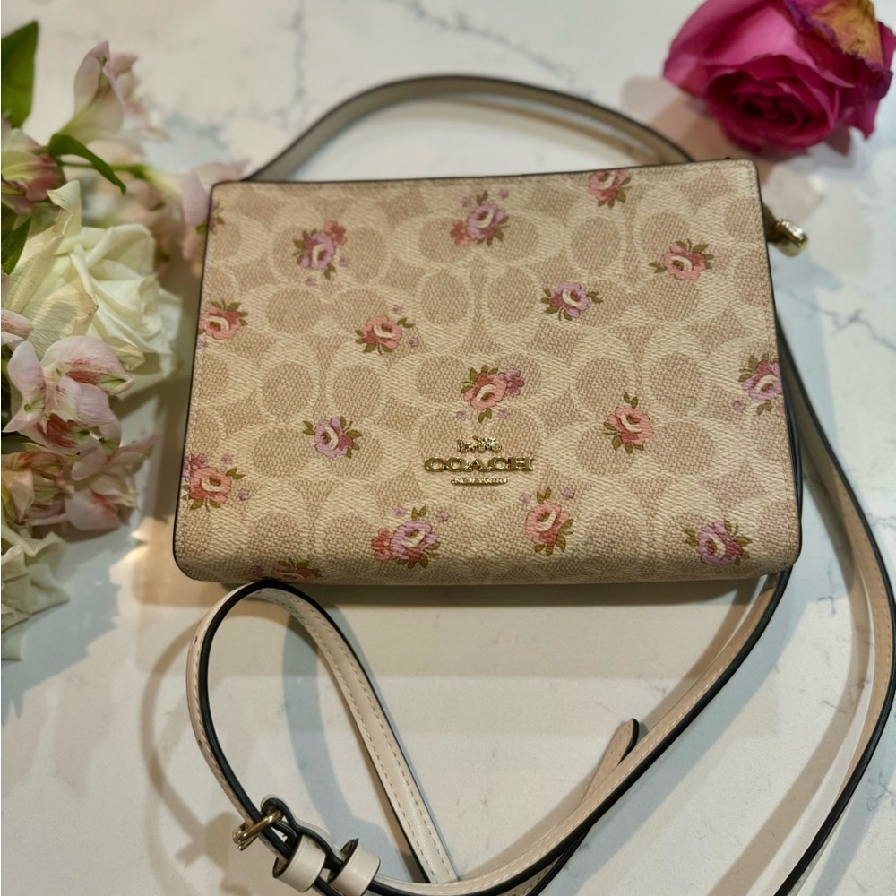 Slim Crossbody Bag In Signature Canvas With floral print